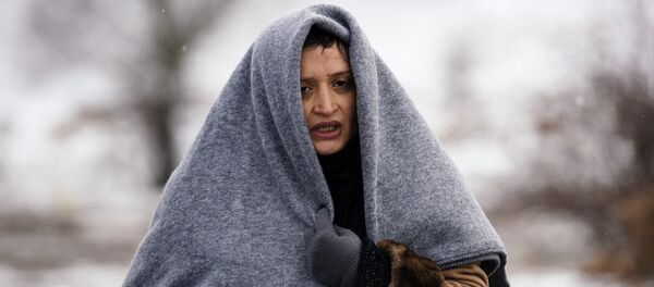 Una refugiada Una refugiada - Sputnik Mundo