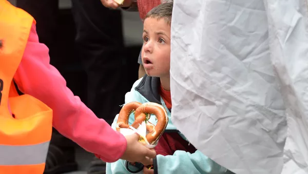 Niño refugiado en Múnich - Sputnik Mundo