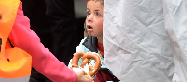 Un niño refugiado - Sputnik Mundo