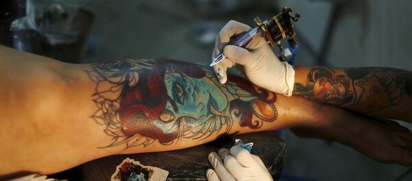 Tatuaje Tatuaje - Sputnik Mundo