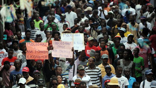 Protesta en Port-au-Prince, Haití - Sputnik Mundo