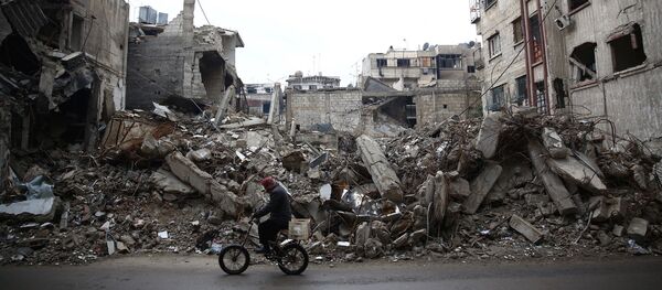 Edificios destruidos en las afueras de Damasco, la capital de Siria - Sputnik Mundo