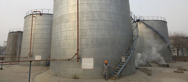 An oil storage tank - Sputnik Mundo