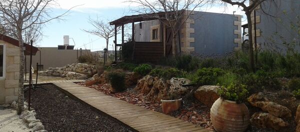 Las casas que alquila Manit Ravinovich en Kida - Sputnik Mundo