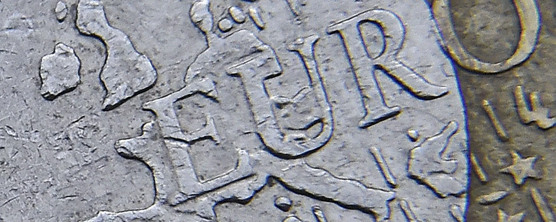 Detail of a European map, including Great Britain, is seen on the face of a Euro coin in London, Britain Detail of a European map, including Great Britain, is seen on the face of a Euro coin in London, Britain - Sputnik Mundo, 1920, 01.01.2022