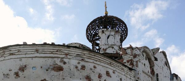 Una iglesia destruida en Donetsk - Sputnik Mundo