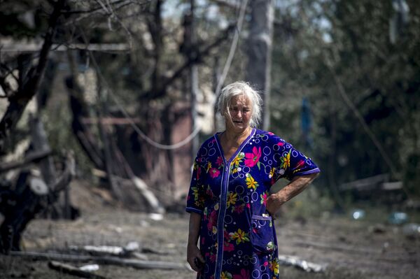 Una mujer local de stanitsa Luganskaya Una mujer local de stanitsa Luganskaya - Sputnik Mundo