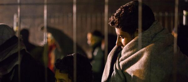 Migrantes - Sputnik Mundo