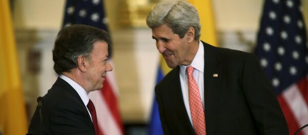 Juan Manuel Santos, presidente de Colombia, y John Kerry, secretario de Estado de EEUU - Sputnik Mundo