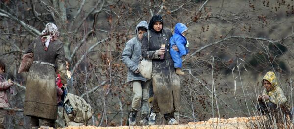 Los sirios en Khirbet Al-Joz, cerca de Latakia - Sputnik Mundo