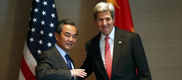 Secretario de Estado de EEUU, John Kerry y ministro de Exteriores de China, Wang Yi Secretario de Estado de EEUU, John Kerry y ministro de Exteriores de China, Wang Yi - Sputnik Mundo