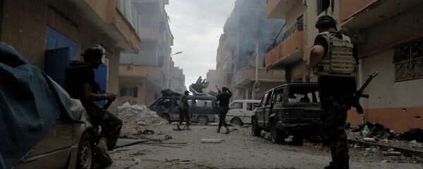 The decrepit state of Libya today is largely a result of the NATO-led war that was launched in 2011.  It is currently in the throes of a massive terrorist-on-terrorist war in Tripoli and Benghazi - Sputnik Mundo
