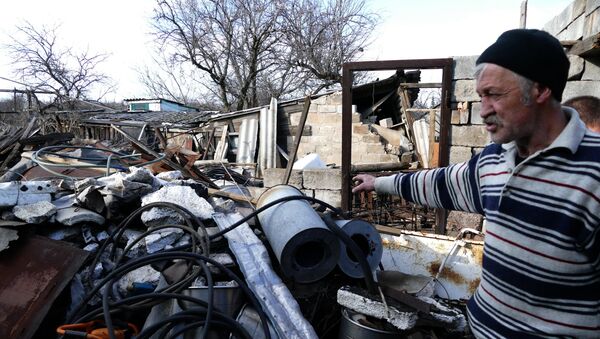 Casa destruida en la región de Donetsk Casa destruida en la región de Donetsk - Sputnik Mundo