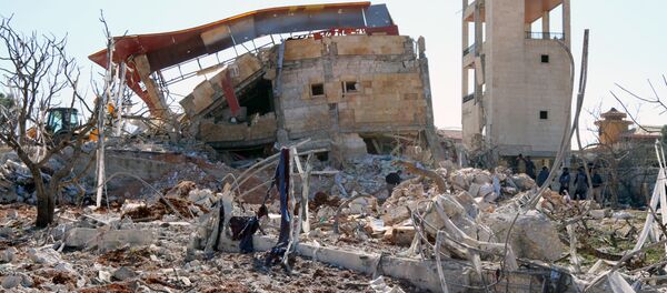 Restos de un edificio en Siria - Sputnik Mundo