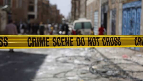 Police tape cordons off the site of a car bomb attack in Sanaa, Yemen, Tuesday, June 30, 2015. - Sputnik Mundo