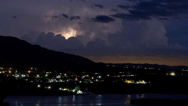 In this Feb. 12, 2016 photo, lightening strikes near the town of Capilla del Monte, Cordoba, Argentina - Sputnik Mundo