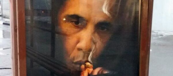 Póster con imagen de Barack Obama, el presidente de EEUU - Sputnik Mundo