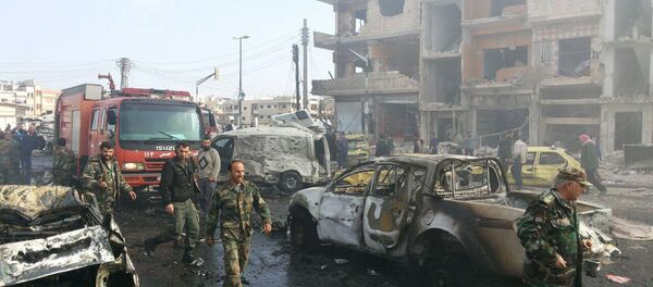 Lugar del atentado en la ciudad de Homs - Sputnik Mundo