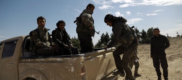 Militantes de la Fuerzas Democráticas Sirias (archivo) Militantes de la Fuerzas Democráticas Sirias (archivo) - Sputnik Mundo