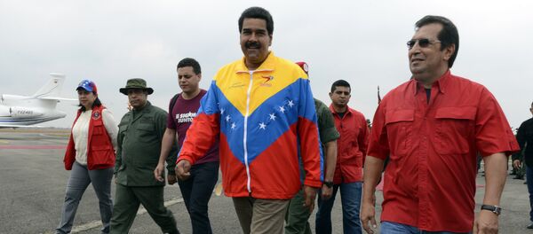 Nicolás Maduro, presidente de Venezuela, y Adán Chávez, Ministro de Cultura de Venezuela - Sputnik Mundo