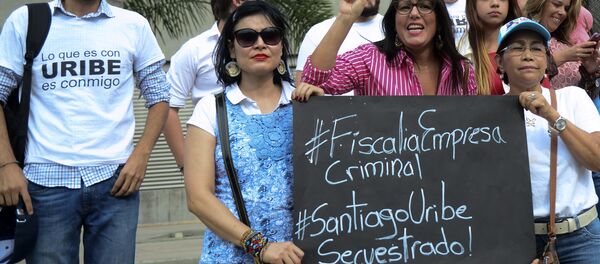 Partidarios de Santiago Uribe - Sputnik Mundo