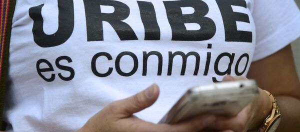 Partidario de Santiago Uribe - Sputnik Mundo