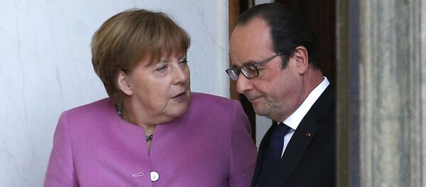 Canciller de Alemania, Angela Merkel y presidente de Francia, François Hollande - Sputnik Mundo