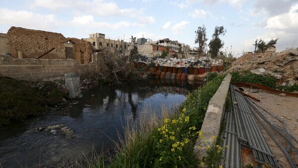 Edificios destruidos cerca de Damasco, la capital de Siria - Sputnik Mundo