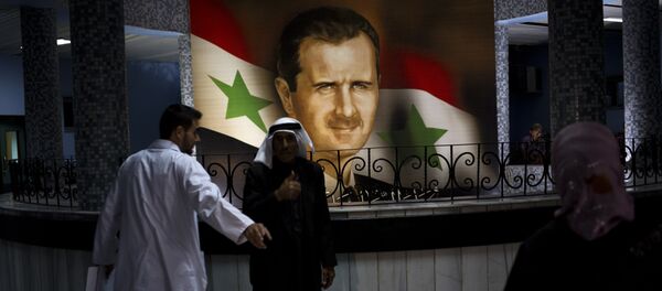Retrato de Bashar Asad, presidente de Siria, en el Hospital de Damasco (archivo) Retrato de Bashar Asad, presidente de Siria, en el Hospital de Damasco (archivo) - Sputnik Mundo