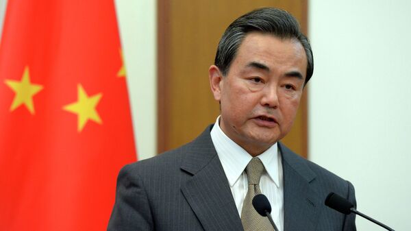 Wang Yi, ministro de Relaciones Exteriores de China - Sputnik Mundo