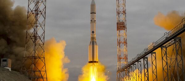 El cohete portador Protón-M parte desde Baikonur el 14 de marzo - Sputnik Mundo