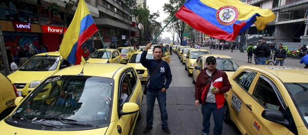Protestas de taxistas colombianos en contra de Uber, Bogotá  - Sputnik Mundo