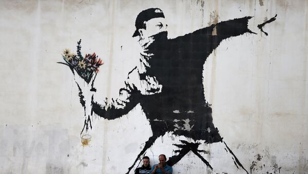 Un grafiti de Banksy - Sputnik Mundo