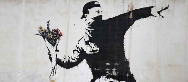 Un grafiti de Banksy - Sputnik Mundo
