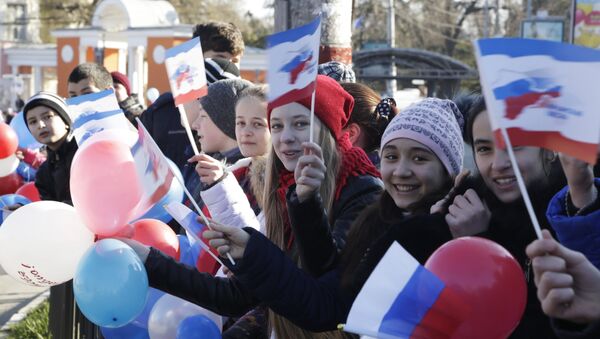 La celebración del 2 aniversario de la adhesión de Crimea a Rusia - Sputnik Mundo