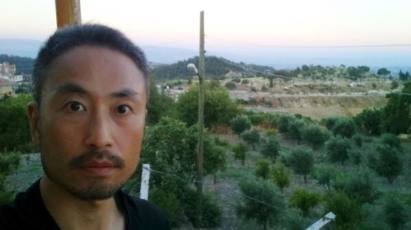 Jumpei Yasuda, el periodista japonés, antes de su viaje a Siria - Sputnik Mundo