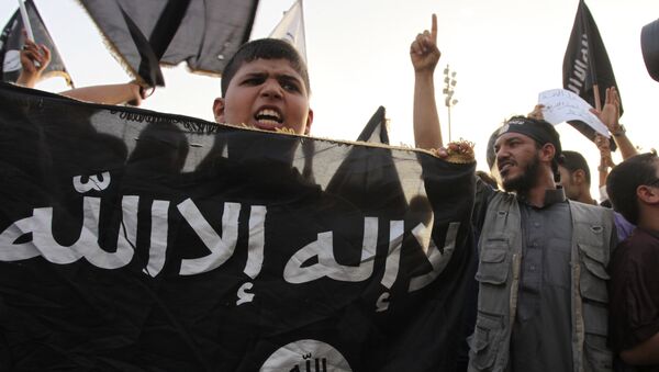 Seguidores de ISIS (archivo) - Sputnik Mundo