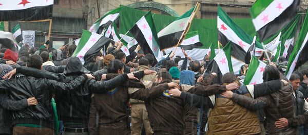 Civil defense members, rebel fighters and civilians carry opposition flags - Sputnik Mundo