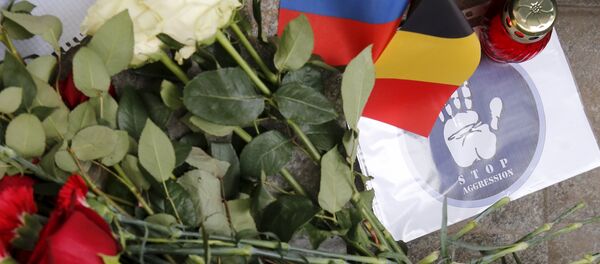 Homenaje a las víctimas de los atentados en Bruselas cerca de la embajada de Bélgica en Moscú - Sputnik Mundo
