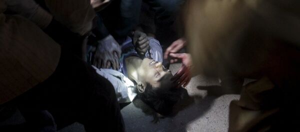 Un hombre herido después de una explosión en Lahore, Pakistán - Sputnik Mundo