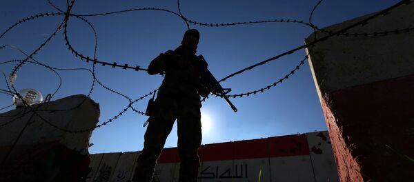 Un militar iraquí Un militar iraquí - Sputnik Mundo