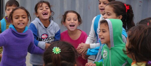 Niños en la ciudad de Palmira - Sputnik Mundo