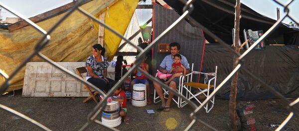 Una familia en Buenos Aires - Sputnik Mundo