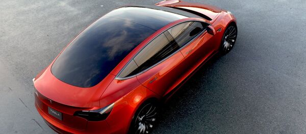 Un Tesla Model 3 - Sputnik Mundo