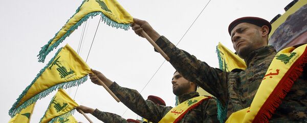 Militares del grupo chií libanés Hizbulá Militares del grupo chií libanés Hizbulá - Sputnik Mundo