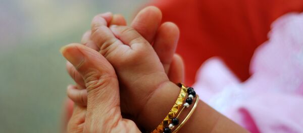 Un bebé - Sputnik Mundo