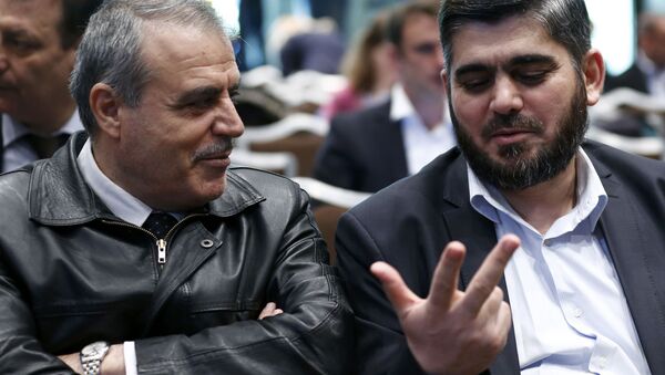 Jefe de la delegación del ACN, Asad al Zoubi y negociador principal del ACN Mohamad Alloush - Sputnik Mundo