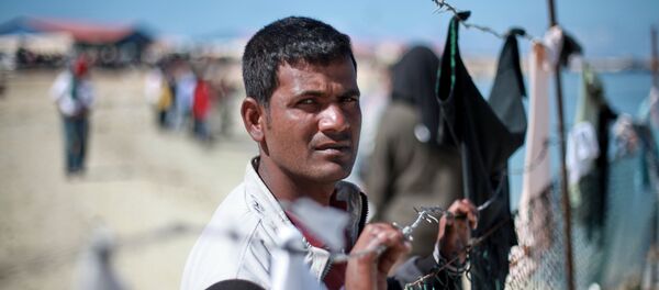 Refugiado libio - Sputnik Mundo