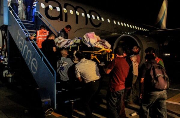 Traslado de heridos y damnificados en vuelos de TAME EP - Sputnik Mundo