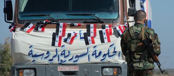 Convoy con la ayuda humanitaria para la localidad siria de Ibta - Sputnik Mundo
